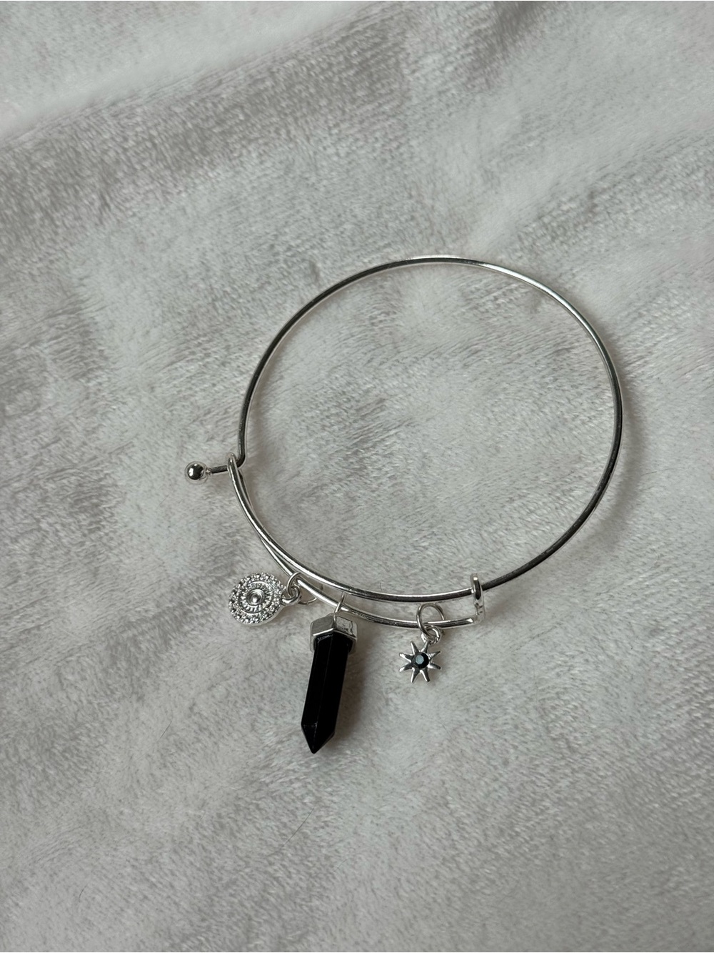 Silver Bangle Bracelet with Black Onyx Spike Charm and Sun & Disc Accents